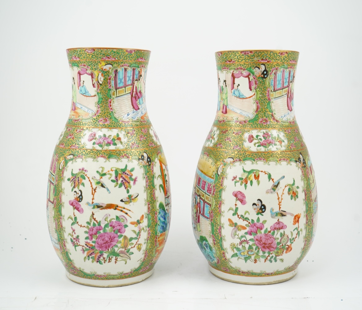 A pair of Chinese famille rose baluster vases, 19th century